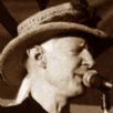 Johnny Winter fazendo uso do Slide.